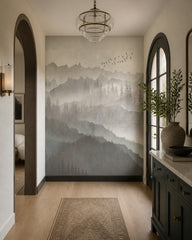 Serene mountain landscape wallpaper in an architectural hallway.