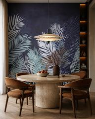 Dark navy palm leaves wallpaper in a refined dining area.