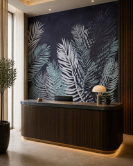 Dark navy palm leaves wallpaper at a hotel reception desk.