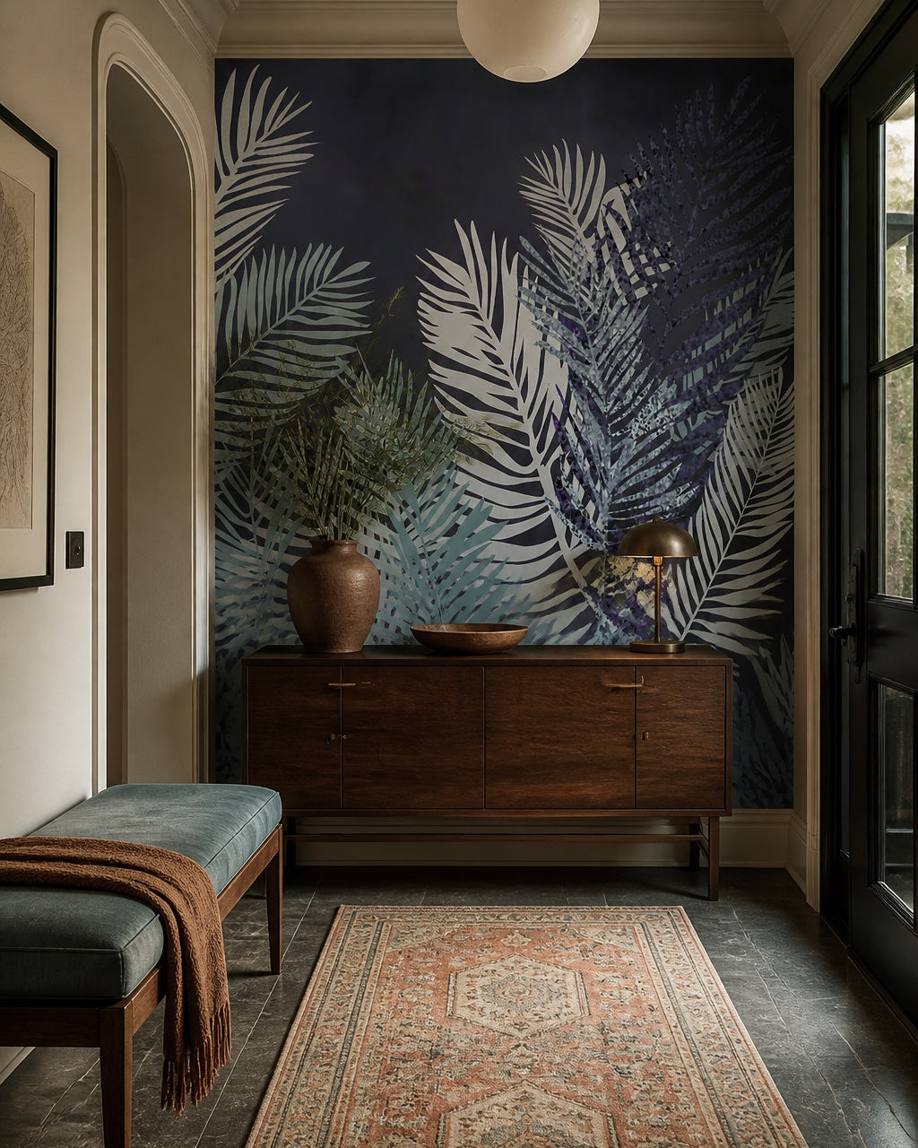 Dark navy palm leaves wallpaper in a refined foyer.