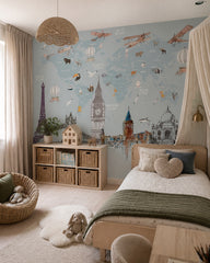 World landmarks, animals & vintage airplanes map mural in a girl’s bedroom.