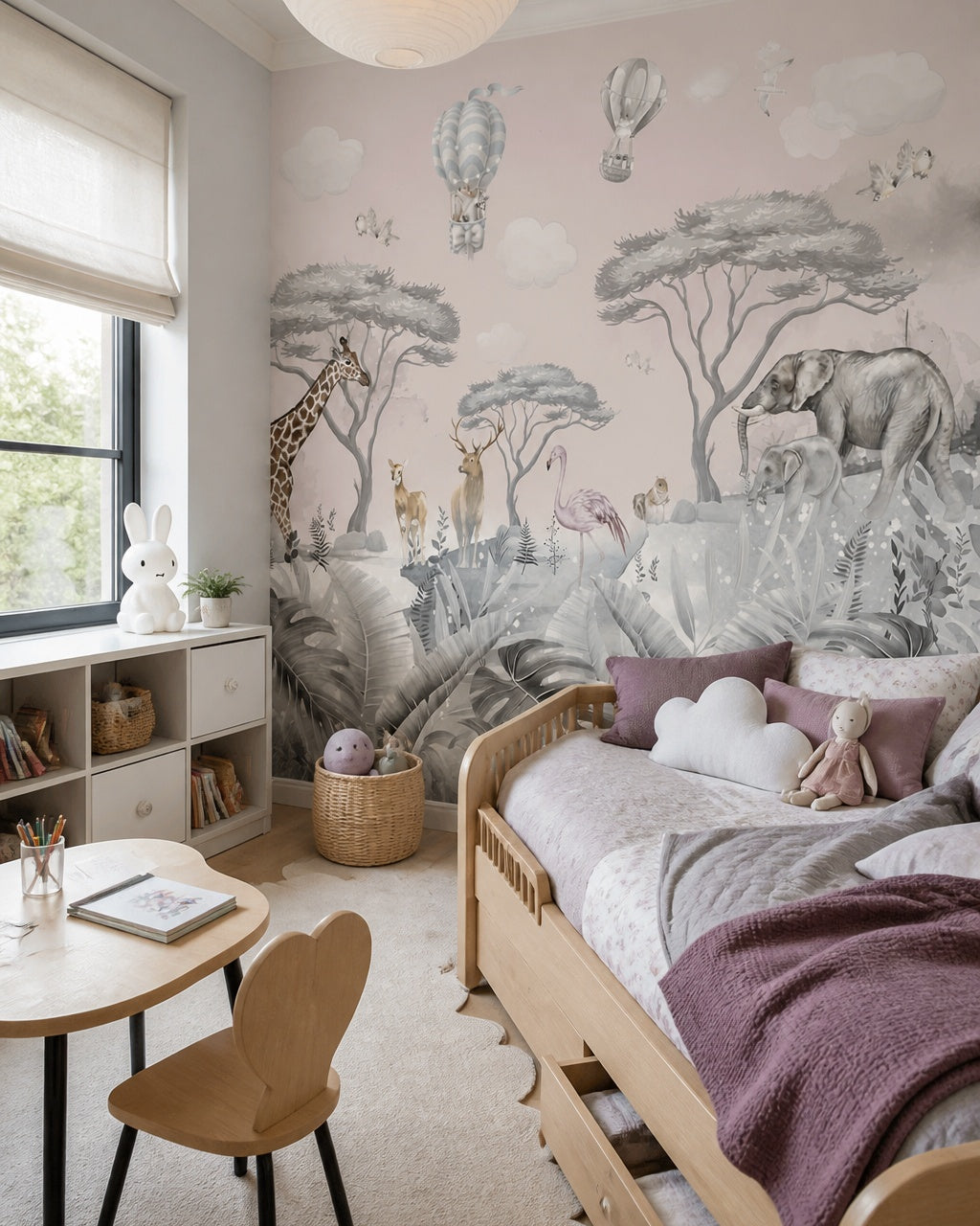 Kids safari animals wallpaper in a girl’s bedroom.