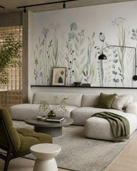 Watercolor meadow wallpaper in a designer living room.