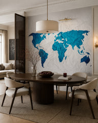 Crumpled paper world map wallpaper in a refined dining area.