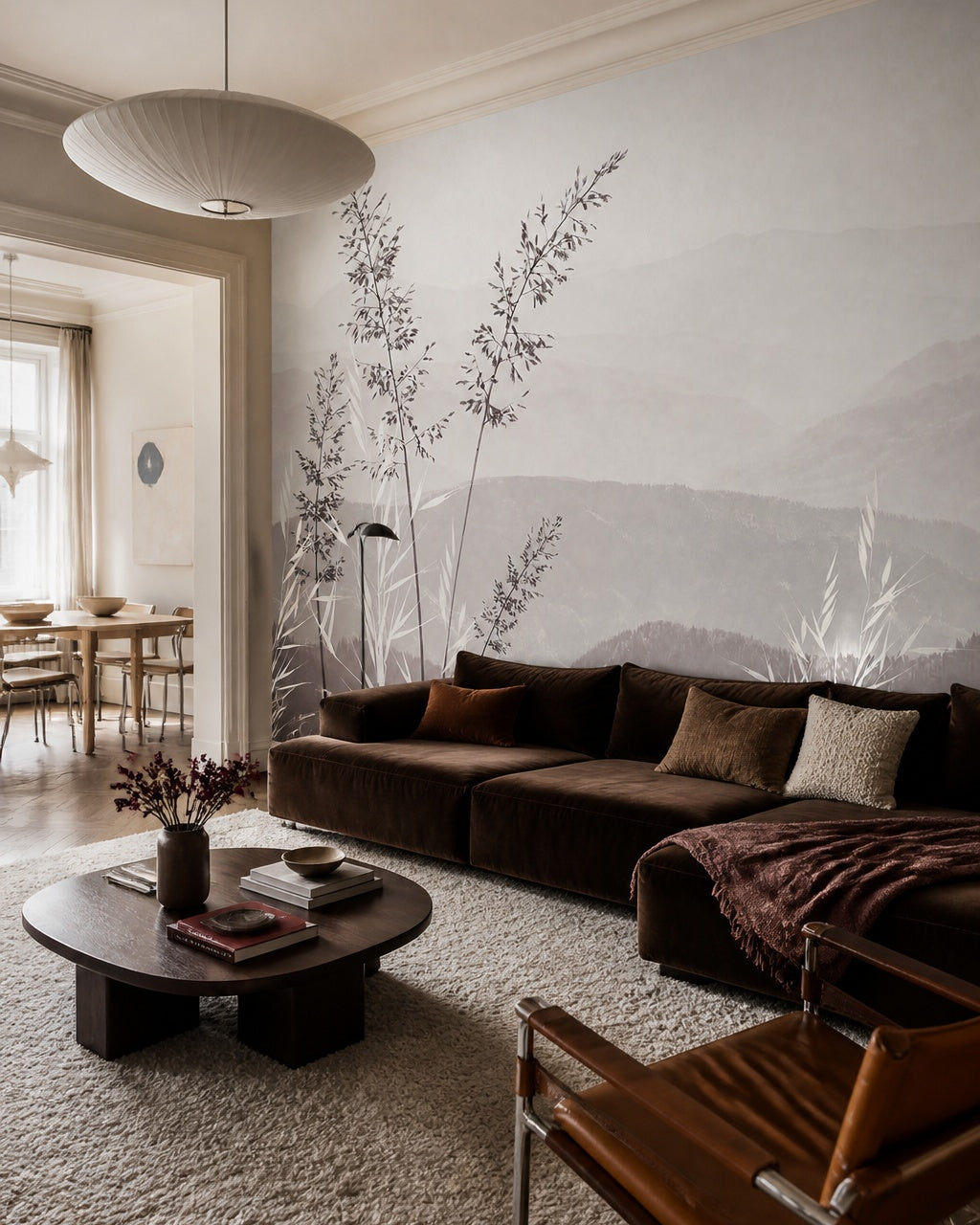Calm mountains and grass wallpaper in a designer living room.