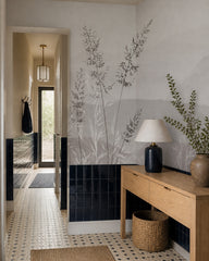 Calm mountains and grass wallpaper in an architectural hallway.