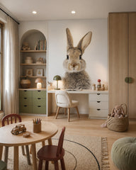 Bunny portrait wallpaper in a children’s playroom.