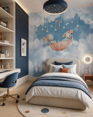 Bunnies in umbrella wallpaper in a girl’s bedroom.