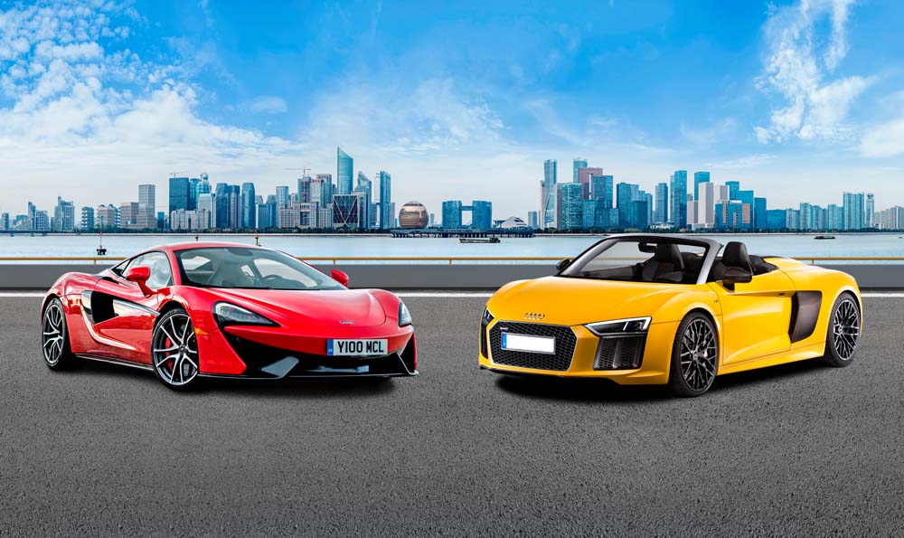 Supercars in Urban Landscape Wall Mural - Vibrant McLaren and Audi Against City Skyline