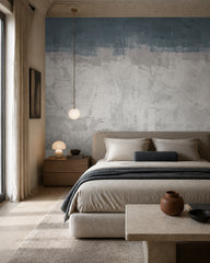 Blue and grey concrete wallpaper in a designer bedroom.