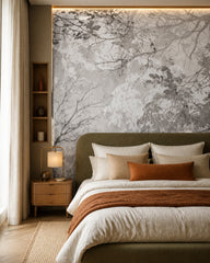 Grey leaves and branches wallpaper in a designer bedroom.
