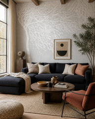 White blossom tree wallpaper in a designer living room.