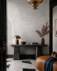 White blossom tree wallpaper in a refined foyer.