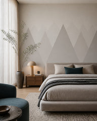 Soft neutral mountains kids room wallpaper in a designer bedroom.