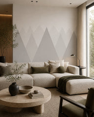 Soft neutral mountains kids room wallpaper in a designer living room.