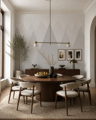 Soft neutral mountains kids room wallpaper in a refined dining area.