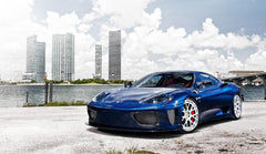 Custom Modern Sports Car with City Skyline Wall Mural Wallpaper - Blue Ferrari in Urban Setting