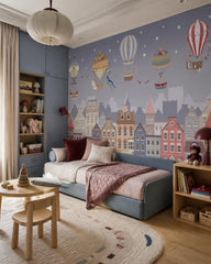 Vintage balloons over the twilight town wallpaper in a toddler bedroom with a child-sized bed.