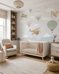 Vintage airplanes and balloons kids room wallpaper in a modern nursery with a crib.