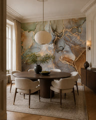 Green and gold marble wallpaper in a refined dining area.