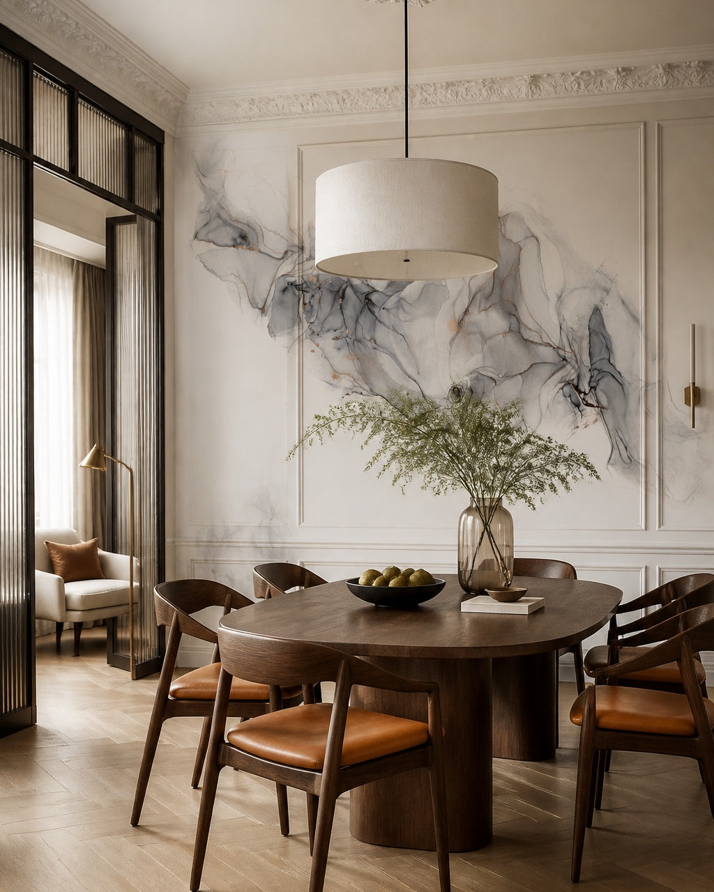 Grey and gold ink wallpaper in a refined dining area.