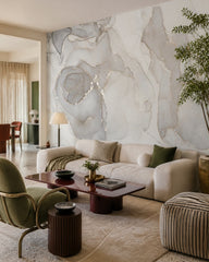 Grey marble effect wallpaper in a designer living room.