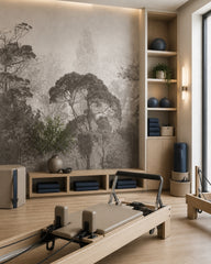 Misty grey forest wallpaper in a fitness studio.