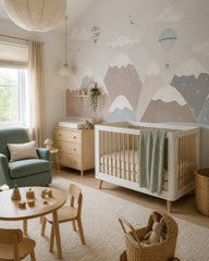 Dreamy balloons above snowy mountains nursery wallpaper in a modern nursery with a crib.