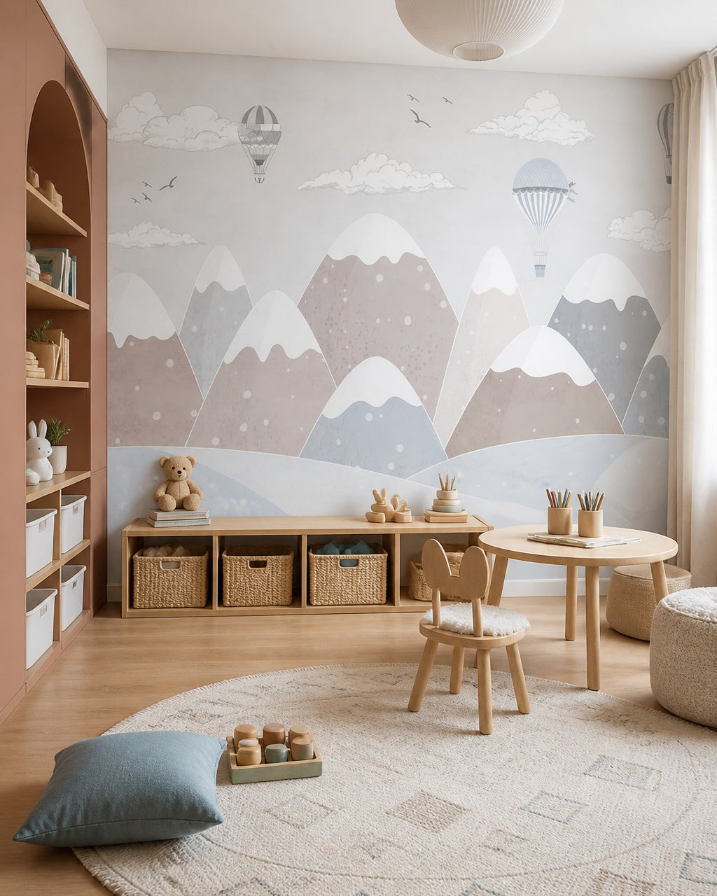 Dreamy balloons above snowy mountains nursery wallpaper in a children’s playroom.