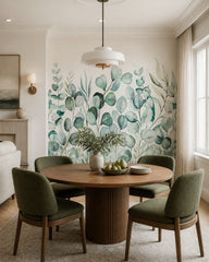Eucalyptus leaves wallpaper in a refined dining area.
