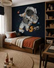 Cartoon astronaut wallpaper in a boy’s bedroom.