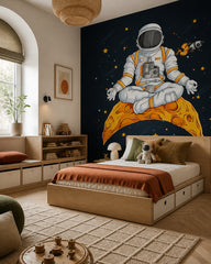 Meditating astronaut wallpaper in a boy’s bedroom.