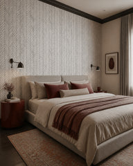 Black and white herringbone wallpaper in a designer bedroom.