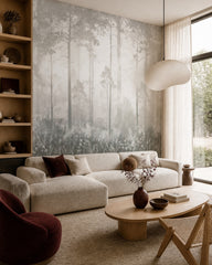 Ethereal misty forest wallpaper in a designer living room.