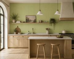 Pistachio green textured wallpaper in a light oak kitchen with open shelving.