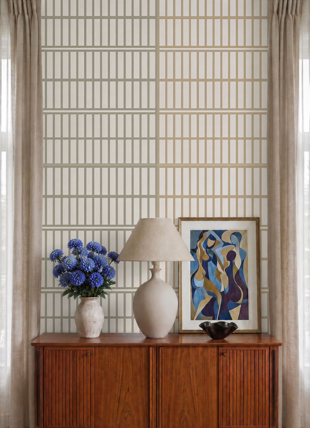 Cream tile effect wallpaper close-up behind a vintage sideboard with lamp and blue flowers.