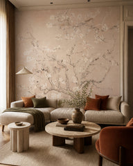 Blush almond blossom wallpaper in a designer living room.