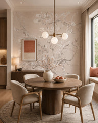 Blush almond blossom wallpaper in a refined dining area.