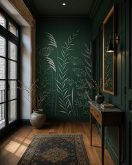 Emerald green botanical line art wallpaper in a dark entry hall with wooden console and oriental rug.