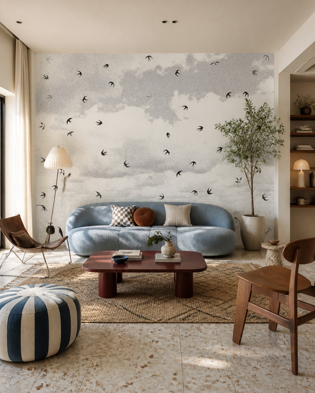 Swallows in flight wallpaper in a designer living room.