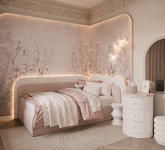 Dusty pink wildflower wallpaper in a girls’ bedroom with backlit headboard.