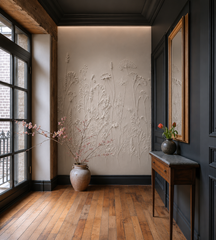 White 3D effect wildflower wallpaper in an entry with dark paneled walls and wooden console.
