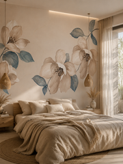 Watercolor magnolia wallpaper behind the bed in a boho bedroom.