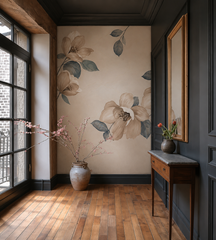 Watercolor magnolia wallpaper in an entry with dark paneled walls.