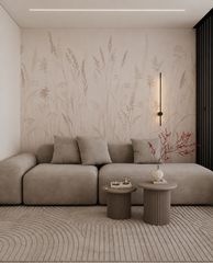 Beige meadow grass wallpaper behind a modular sofa in a minimalist living room.
