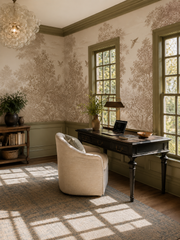 Neutral vintage forest mural with detailed foliage, birds and tropical plants behind a wooden bench in an entryway.