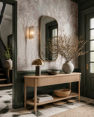 Pastel floral forest wallpaper in a designer entrance hall.