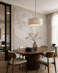 Minimalist moon and arches wallpaper in a refined dining area.