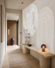 Minimalist moon and arches wallpaper in an architectural hallway.