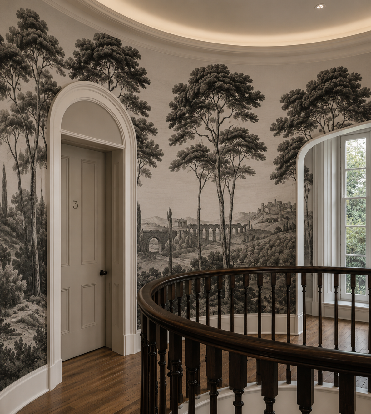 Black and white Italian toile wallpaper on a curved staircase landing.